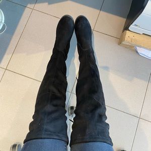 Knee high black boots